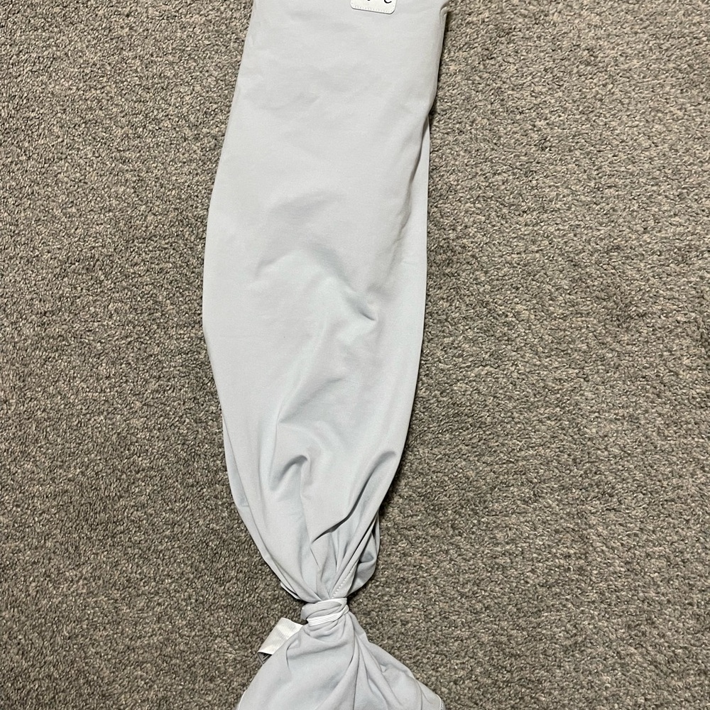 Light Grey Ollie Swaddle. Only used a few times, like new!